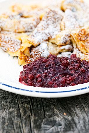 Kaiserschmarren, typical omelet with cranberries, South Tyrol, Dolomites, Italy