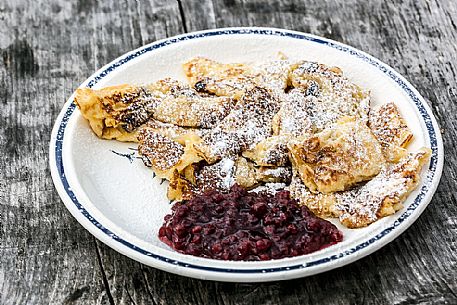Kaiserschmarren, typical omelet with cranberries, South Tyrol, Dolomites, Italy