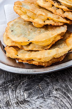 Turtres (pancakes stuffed with cheese and spinach), traditional ladin food, South Tyrol, Dolomites, Italy 