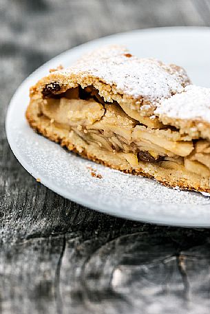 Strudel, typical sweet cake of Dolomites, South Tyrol, Dolomites, Italy