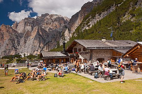 Tourists and hikers are resting at Scotoni hut, Badia Valley,South Tyrol, Dolomites, Italy 