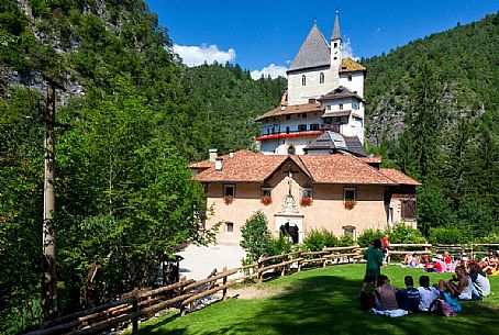 Tourists admire the San Romedio Sanctuary, Val di Non, Trentino, Italy