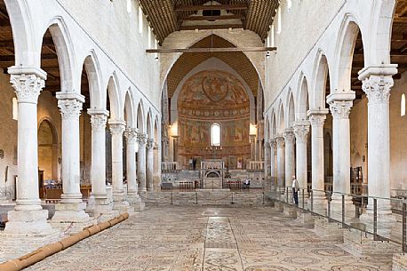 Floor mosaic and the magnificent frescoed ceiling of the Basilica of Aquileia, Italy