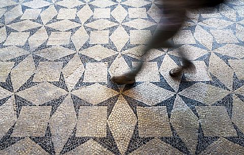 The floor mosaic in the archaeological site of Basilica of Concordia Sagittaria, Venice, Italy