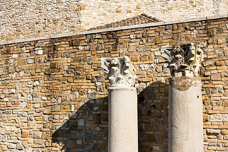 Detail of two capitals in the Roman Catholic church of Aquileia, Italy