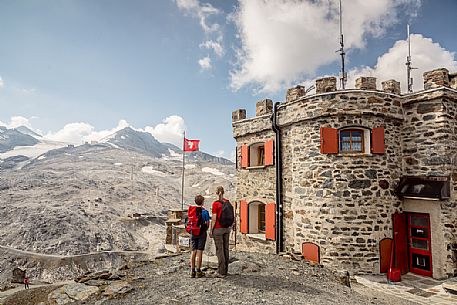 Hikers at Garibaldi hut or Dreisprachenspitze, Stelvio pass, Stelvio national park, Italy