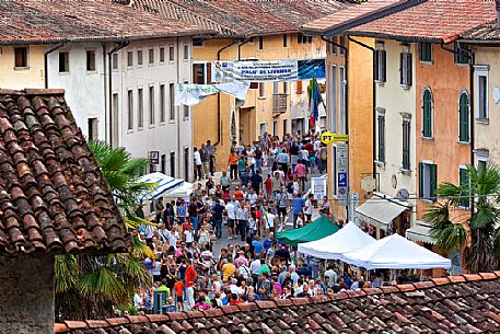 People at the ancient Sagra dei Sèst o Thest feast in Polcenigo, Friuli Venezia Giulia, Italy