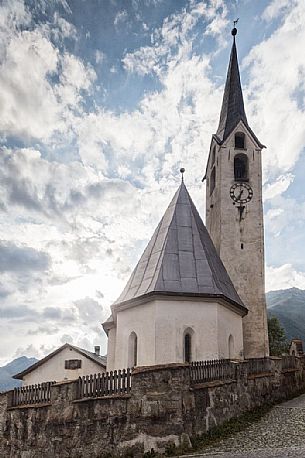 Old church in Guarda, a tipical village with houses ornated with old painted stone 17th Century buildings, Scuol, Engadine, Canton of Grisons, Switzerland, Europe