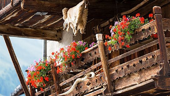 Detail of typical wooden house in Engadin, Canton of Grisons, Switzerland, Europe