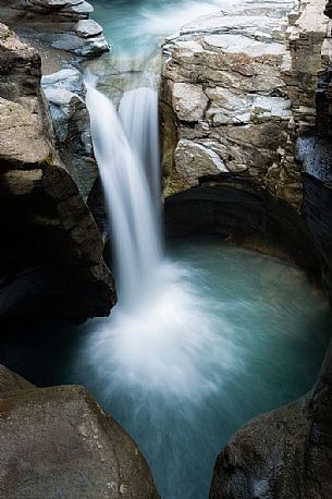 View from above of waterfall in the Cavaglia Glacial Garden also referred to as Giants Pots, Cavaglia, Poschiavo valley, Engadin, Canton of Grisons, Switzerland, Europe
