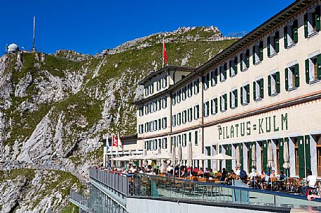 Tourists on the terrace of Pilatus Klum hotel on Pilatus mountain top, Lucerne, Border Area between the Cantons of Lucerne, Nidwalden and Obwalden, Switzerland, Europe