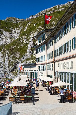 Tourists on the terrace of Pilatus Klum hotel on Pilatus mountain top, Lucerne, Border Area between the Cantons of Lucerne, Nidwalden and Obwalden, Switzerland, Europe