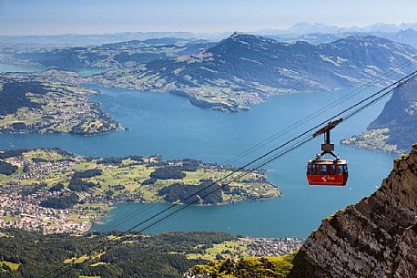 View from Pilatus Mountain of the Aerial Cableway from Lucerne, in the background the Lucerne lake, Border Area between the Cantons of Lucerne, Nidwalden and Obwalden View from Pilatus Mountain of the Aerial Cableway from Lucerne, in the background the Lucerne lake, Border Area between the Cantons of Lucerne, Nidwalden and Obwalden