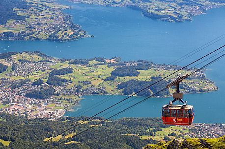 View from Pilatus Mountain of the Aerial Cableway from Lucerne, in the background the Lucerne lake, Border Area between the Cantons of Lucerne, Nidwalden and Obwalden View from Pilatus Mountain of the Aerial Cableway from Lucerne, in the background the Lucerne lake, Border Area between the Cantons of Lucerne, Nidwalden and Obwalden