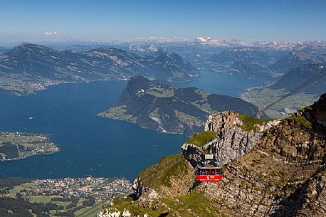 View from Pilatus Mountain of the Aerial Cableway from Lucerne, in the background the Lucerne lake, Border Area between the Cantons of Lucerne, Nidwalden and Obwalden View from Pilatus Mountain of the Aerial Cableway from Lucerne, in the background the Lucerne lake, Border Area between the Cantons of Lucerne, Nidwalden and Obwalden