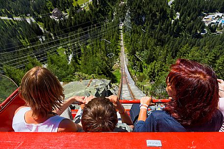 Tourists come down with the Gelmerbahn funicular, the steepest in the world, Canton of Bern, Switzerland, Europe
