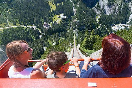 Tourists come down with the Gelmerbahn funicular, the steepest in the world, Canton of Bern, Switzerland, Europe
