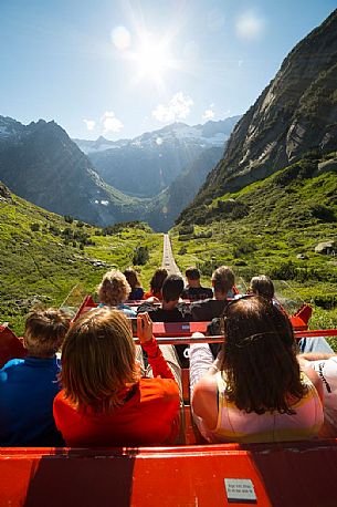 Tourists come down with the Gelmerbahn funicular, the steepest in the world, Canton of Bern, Switzerland, Europe
