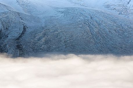 Detail of Gorner glacier in the fog from Gornergrat top, Monte Rosa or Breithorn mountain range, Zermatt, Valais, Switzerland, Europe
 