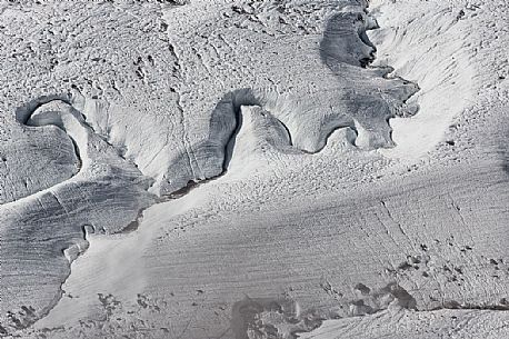 Detail of stream in the Gorner glacier from Gornergrat mountain top, Monte Rosa or Breithorn mountain range, Zermatt, Valais, Switzerland, Europe
 