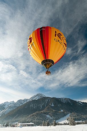 Hot air balloon festival in Pusteria valley, in the background the Dolomites of Sexten, Dobbiaco, Trentino Alto Adige, Italy, Europe