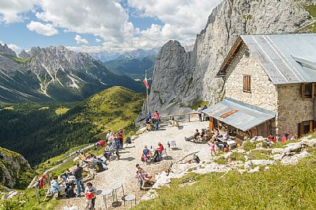 Hikers at Calvi mountain hut in Sesis valley, Sappada, dolomites, Friuli Venezia Giulia, Italy, Europe