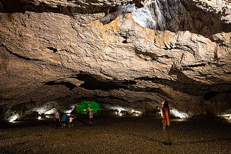 Tourists inside the Pradis Caves, Clauzetto, Friuli Venezia Giulia, Italy, Europe