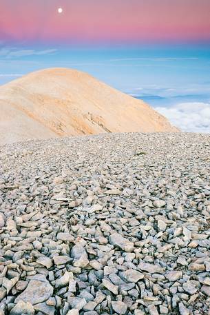 The moon rise over the Mount Acquaviva in the amphitheater of the Murelle, Majella national park, Abruzzo, Italy, Europe