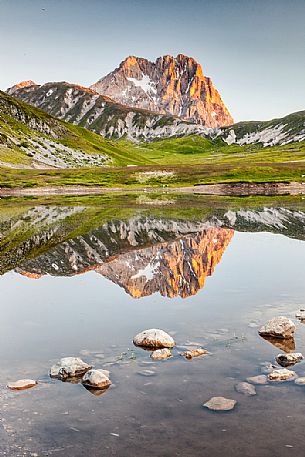 The Corno Grande peak reflected on Pietranzoni lake, Campo Imperatore, Gran Sasso and Monti della Laga national park, Abruzzo, Italy, Europe