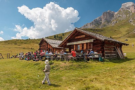 Tourists at Utia Vaciara hut, Badia valley, dolomites, South Tyrol, Italy, Europe