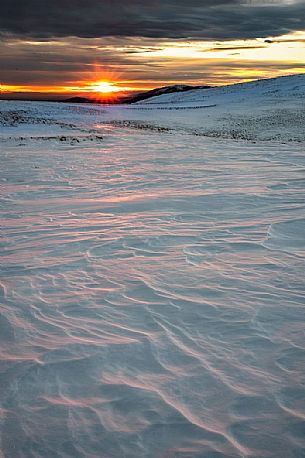 Winter sunset from the top of Pizzoc mount, Cansiglio, Veneto, Italy, Europe