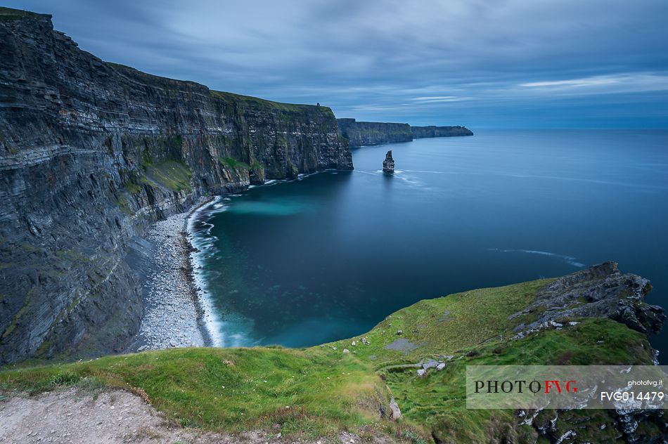 The end of the Cliffs of Moher's path, after sunset, reveals the whole nature and morphology of the place