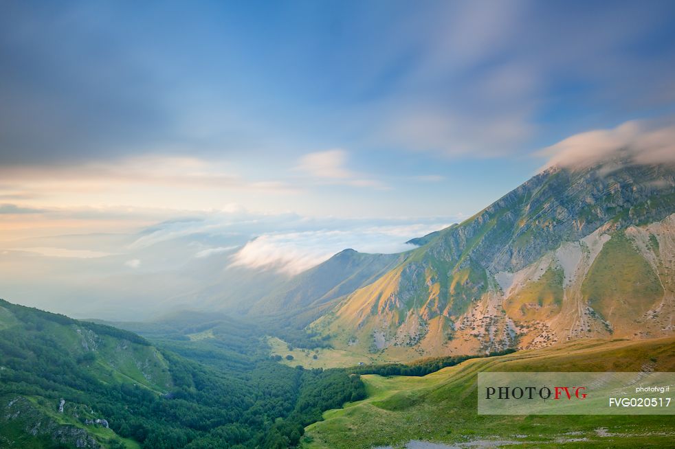 The Chiarino Valley, one of the great valleys of the Gran Sasso Mountains, and the corvo Mountain in the background, at sunset.