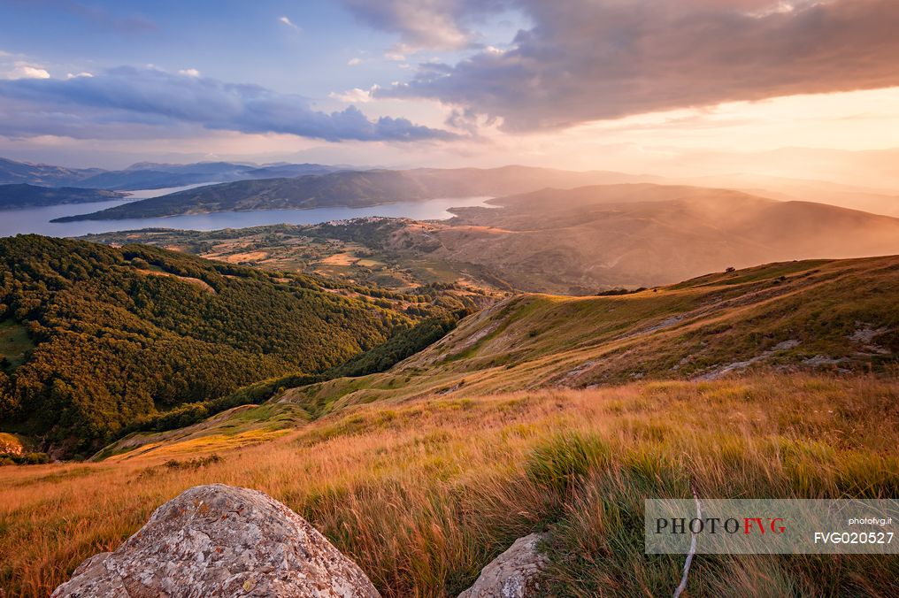 Lake Campotosto at sunset, seen from the Laga mountains, Gran Sasso and Monti della Laga national park, Abruzzo