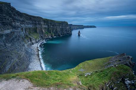 The end of the Cliffs of Moher's path, after sunset, reveals the whole nature and morphology of the place