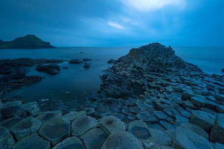 Magical atmosphere at the Giant's Causeway during the blue hour