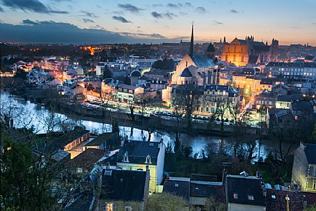 Night view of Poitiers, a wonderful town in the middle-west of France. The river Clain surrounds the town, which stands on the hill above.