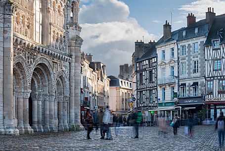 View of Notre-Dame-La-Grand, one of the most important Churches in Poitiers, with its beautiful romanesque facade on the left.