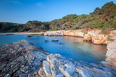 The regional nature park of Porto Selvaggio is a regional park of Puglia site in the province of Lecce. The coast is rugged and rocky, and characterized by pine woods and Mediterranean bush. Along the coast are located the Tower The regional nature park of Porto Selvaggio is a regional park of Puglia site in the province of Lecce. The coast is rugged and rocky, and characterized by pine woods and Mediterranean bush. Along the coast are located the Tower