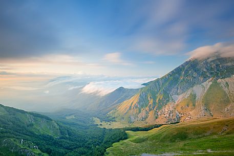 The Chiarino Valley, one of the great valleys of the Gran Sasso Mountains, and the corvo Mountain in the background, at sunset.