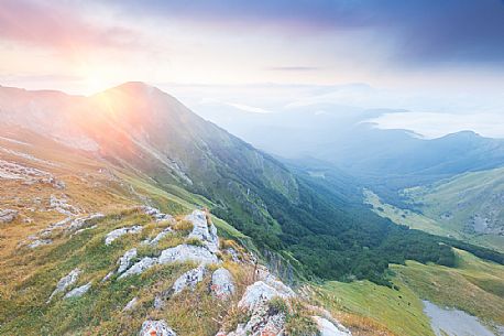 The Chiarino Valley, one of the great valleys of the Gran Sasso Mountains, at sunset. Gran Sasso and Monti della Laga national park, Abruzzo, Italy