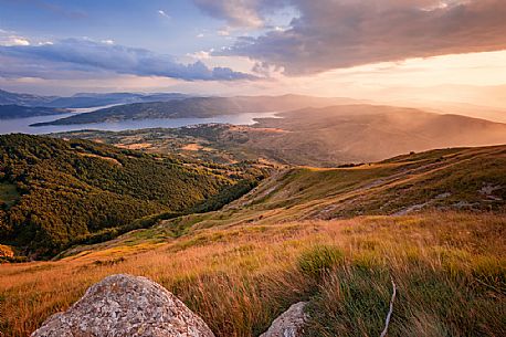 Lake Campotosto at sunset, seen from the Laga mountains, Gran Sasso and Monti della Laga national park, Abruzzo