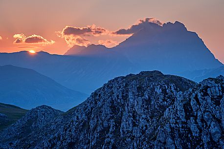The Gran Sasso mountains and peaks seen from Mount Bolza's ridge after sunset