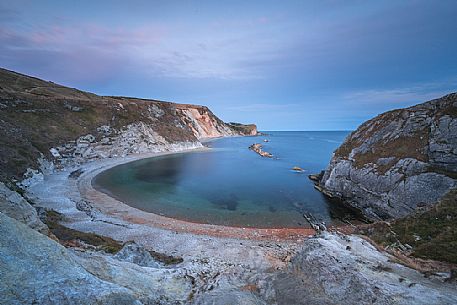 St. Oswald Bay, also known as Man O' War Bay is located right next door to Durdle Door , and has a beautiful half moon shape, Dorset, England, UK