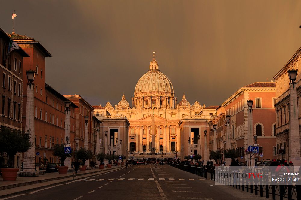 Rome: Street of the Conciliation with St. Peter's Basilica illuminated by the first light of the dawn