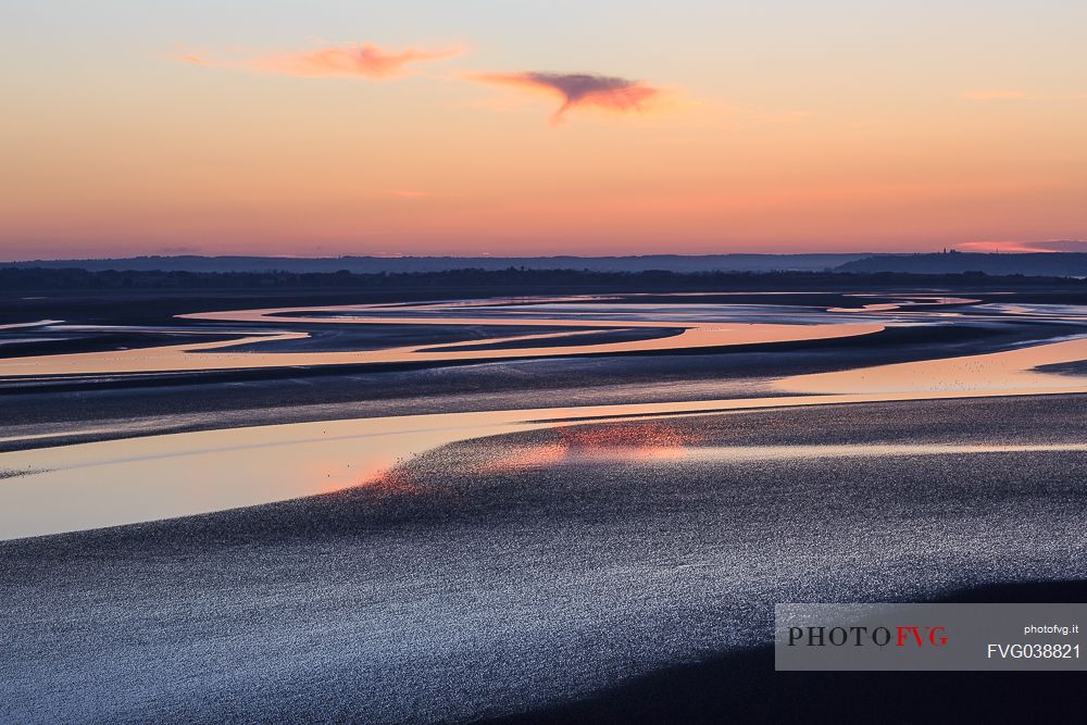Reflections on the bay at dawn, Mont Saint Michel, Normandy, France, Europe