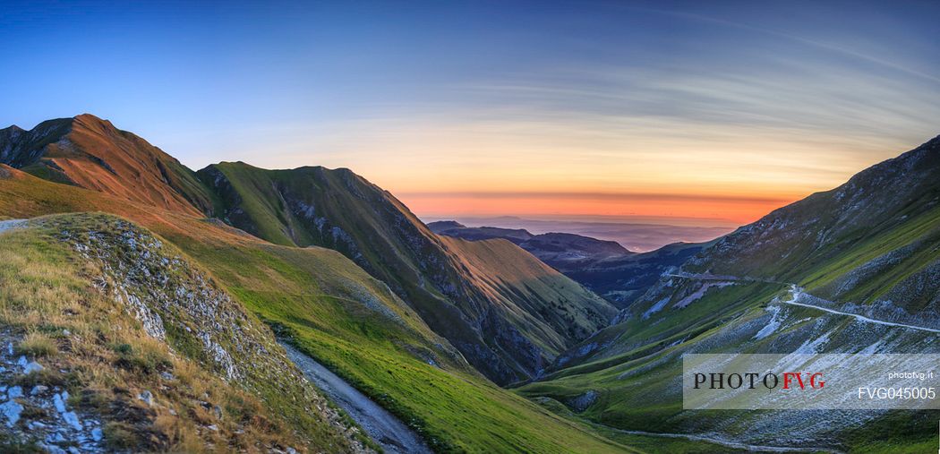 Dawn from the top of Pizzo Tre Vescovi peak and in the background the Adriatic sea, Sibillini national park, Ussita, Marche, Italy, Europe