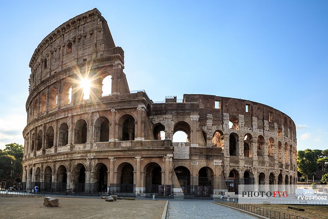 Rome: the early morning sun through the arches of the Colosseum