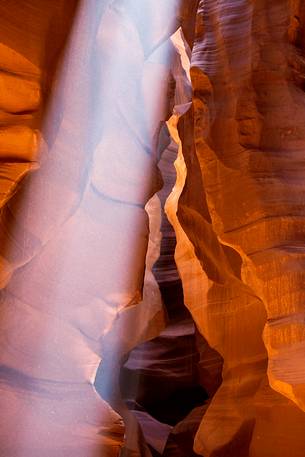 Inside Antelope canyon: the sun shines between the red rocks