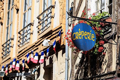 A Creperie's banner in a street of the center of the city of Rennes, Brittany, France